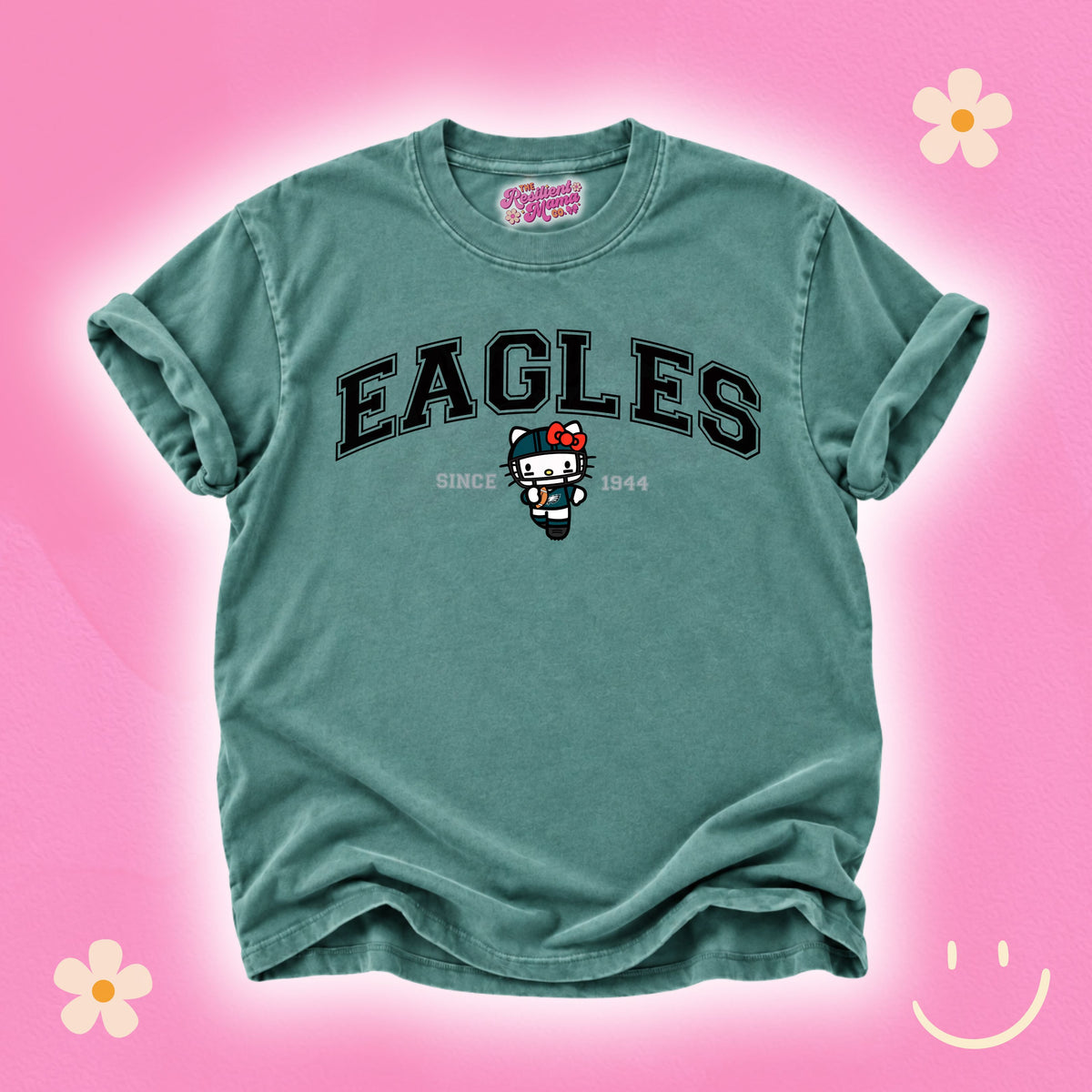 Hello Kitty football graphic T-shirt featuring a cute game day design, perfect for football season and Hello Kitty fans.